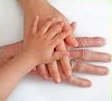 Image of Child and Adult Hands