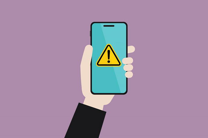 person holding a cell phone with alert symbol