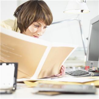 Business Person Reading at Computer.JPG